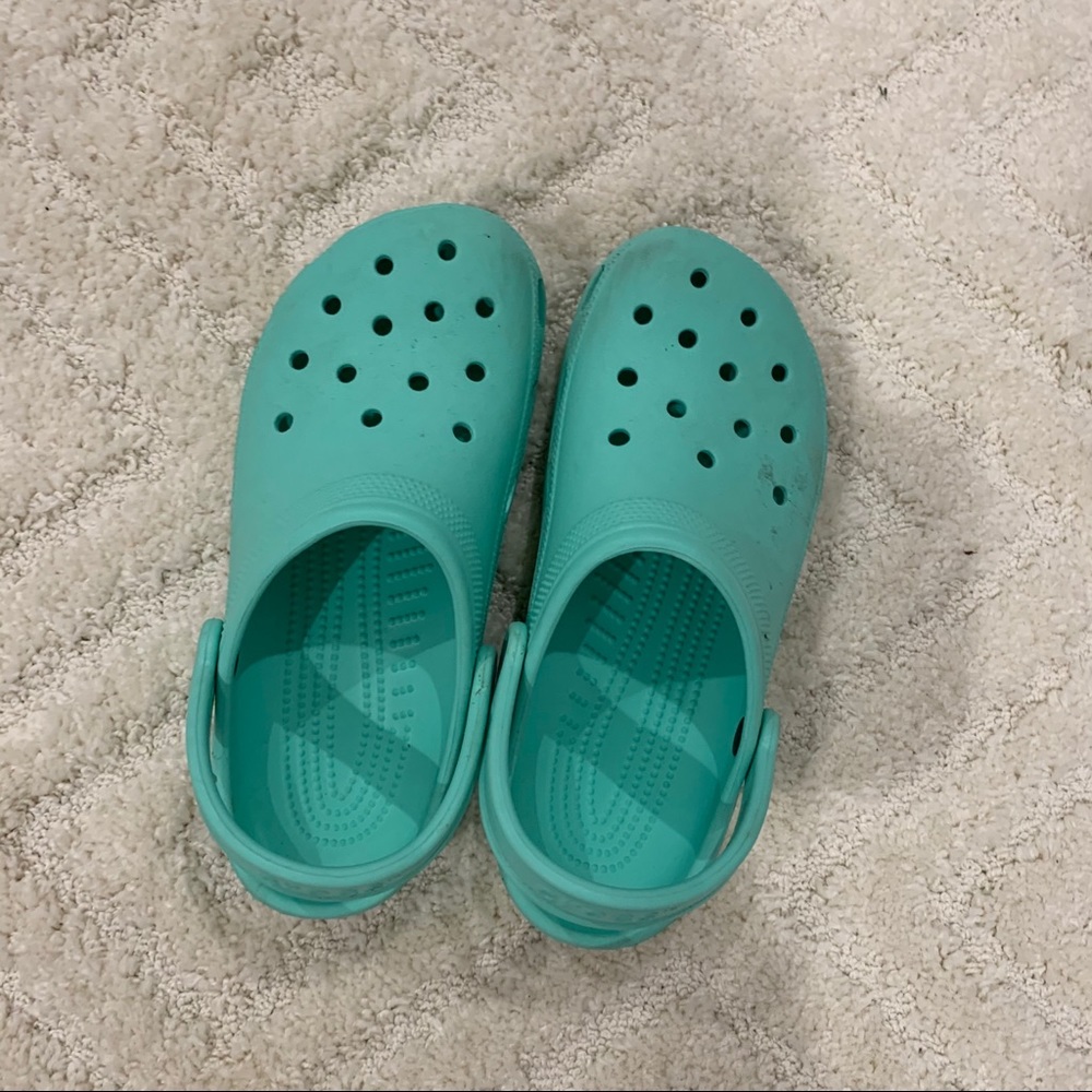 teal crocs